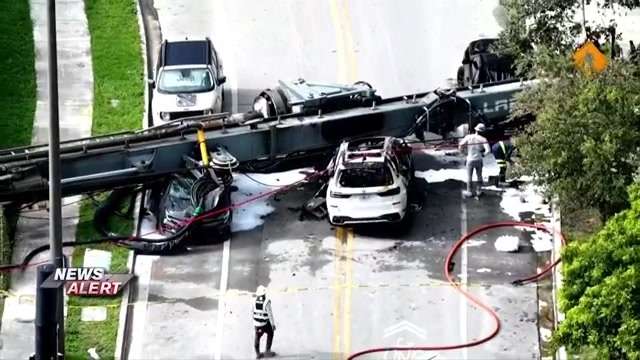 3 construction workers, driver hospitalized after crane collapses on Brickell Bay Drive, sparking SUV fire - WSVN 7News | Miami News, Weather, Sports