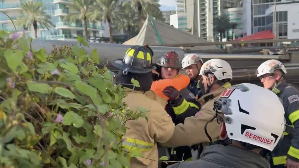 Man hugs firefighter after Brickell rig-collapse rescue
