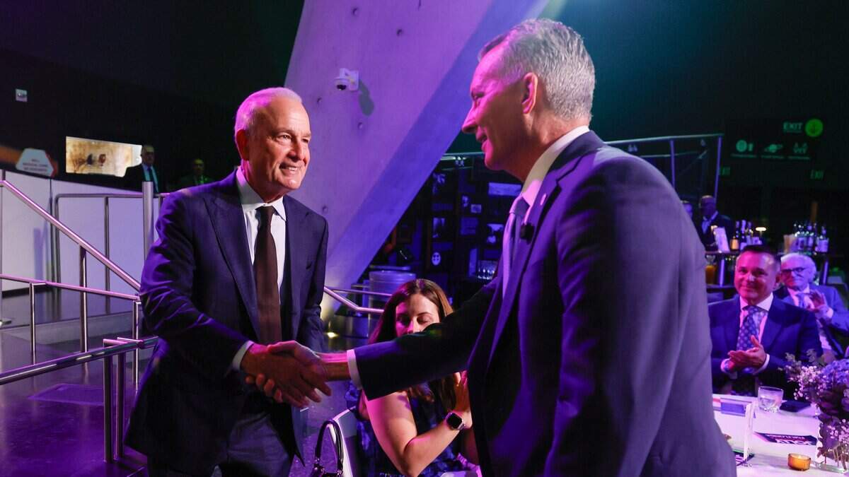 Democratic candidate Eliott Rodriguez, and Florida governor candidate David Jolly seen left to right, greet each other during the Miami-Dade Democratic Party's 2026 Blue Gala at the Frost Science Museum, in Miami. Florida, on Saturday, September 19, 2026.