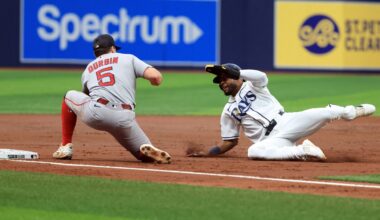 Sep 19, 2026; St. Petersburg, Florida, USA; Boston Red Sox third baseman Caleb Durbin (5) tags out Tampa Bay Rays center fielder Cedric Mullins (31) as he attempted to steal during the third inning at Tropicana Field. Mandatory Credit: Kim Klement Neitzel-Imagn Images