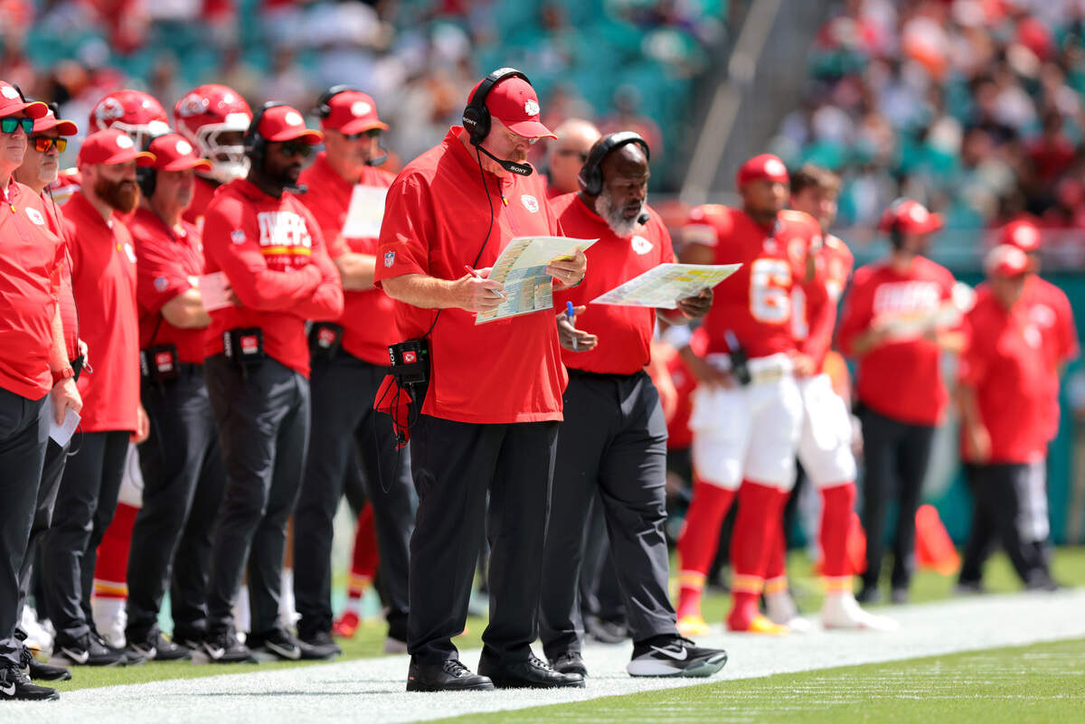 Kansas City Chiefs coach Andy Reid looks at his play sheet during an NFL Week 3 game against the Miami Dolphins at Hard Rock Stadium in Miami Gardens, Florida, on Sunday, Sept. 27, 2026.