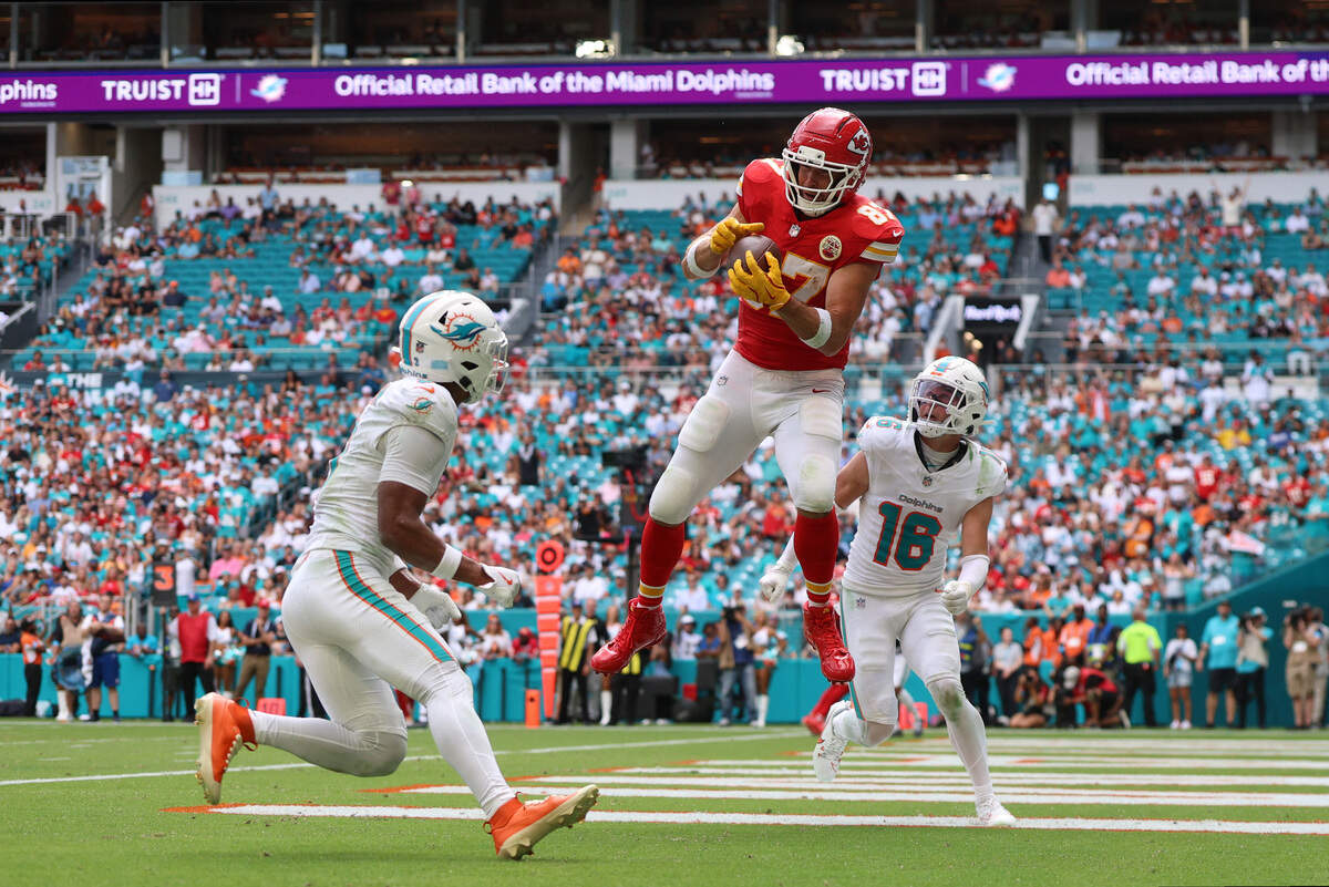 Kansas City Chiefs tight end Travis Kelce (87) scores a touchdown against the Miami Dolphins during an NFL Week 3 game at Hard Rock Stadium in Miami Gardens, Florida, on Sunday, Sept. 27, 2026.