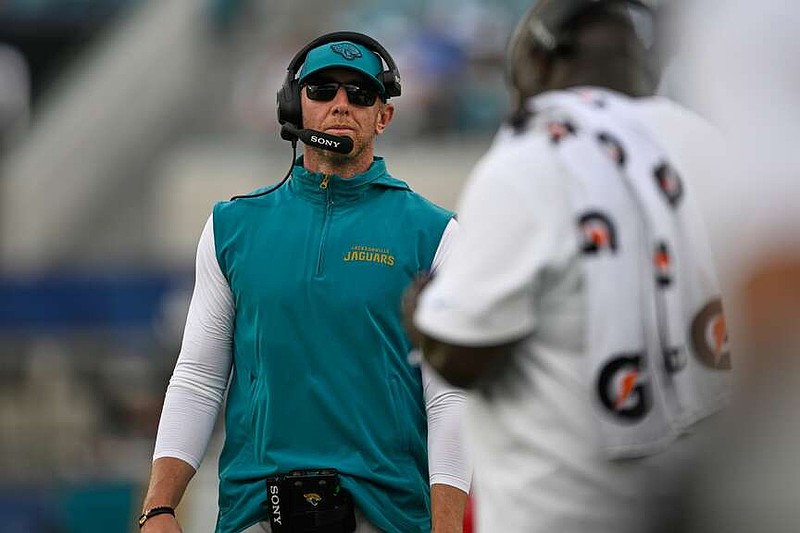Jacksonville Jaguars head coach Liam Coen walks on the sidelines during the second half of an NFL football game against the Cleveland Browns, Sunday, Sept. 13, 2026, in Jacksonville. (AP Photo/Phelan M. Ebenhack)