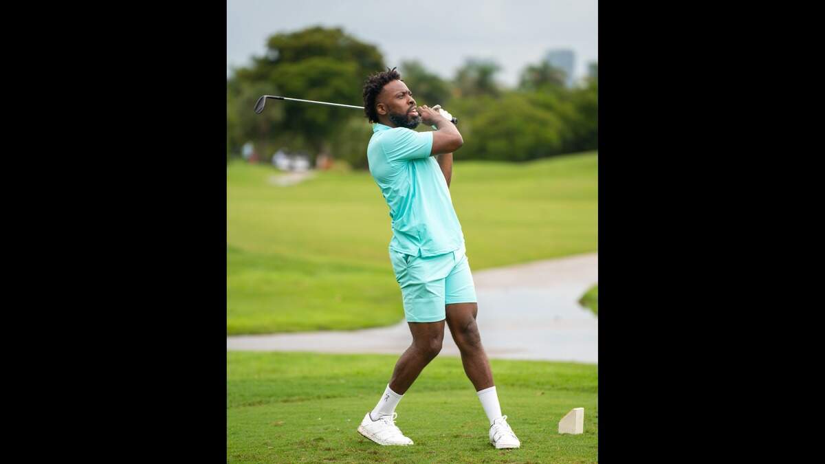 Urban Golf Weekend is hosting its five-day long event series that includes a charity golf tournament and two-day expo, is returning to Miami Beach for its third year. The organization had a role in restarting Booker T. Washington’s golf program. Urban Golf Weekend is hosting its five-day long event series that includes a charity golf tournament and two-day expo, is returning to Miami Beach for its third year. The organization had a role in restarting Booker T. Washington’s golf program. The photo shows a man swinging a club.