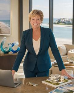 TREASURE ISLAND, Fla., September 2026 — Jill Helgren, a Florida real estate advisor specializing in waterfront, luxury and investment properties, has been named 2025 First Place Advisor at Coastal Properties Group International, an affiliate of Forbes Global Properties Jill Helgren, Florida real estate advisor with Coastal Properties Group International, in a waterfront office setting.