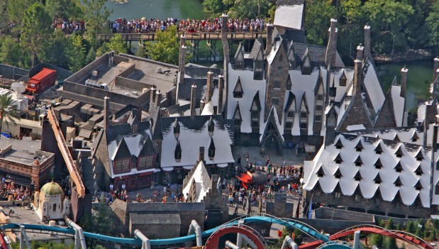 Thousands of guests arrive for the grand opening of the Wizarding World of Harry Potter at Universal's Islands of Adventure in 2010. Gates to the theme park were opened at 6 a.m., as a line of fans snaked as far back as the Hard Rock Cafe at Universal CityWalk.