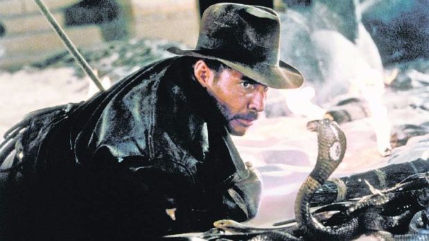 Actor Harrison Ford comes face-to-face with a cobra in a scene "Raiders of the Lost Ark," "which the Orlando Philharmonic will accompany live. You can almost here Indy thinking, "Why did it have to be snakes?" (Orlando Sentinel file photo)