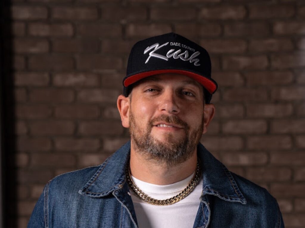 Matt Kuscher, founder of Kush, wearing a Dade County Kush cap.