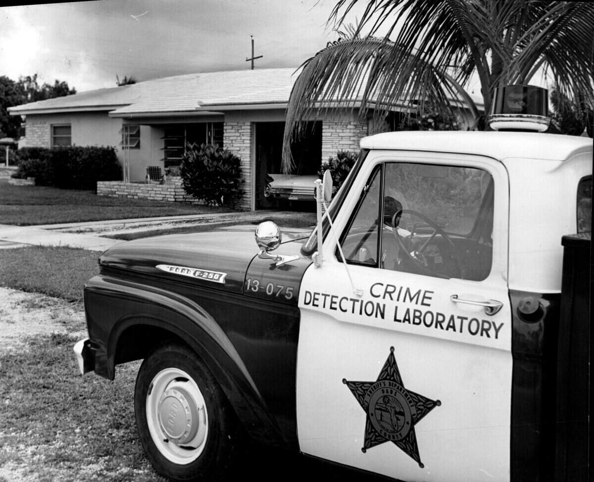A police crime lab truck at a scene in Miami Shores.