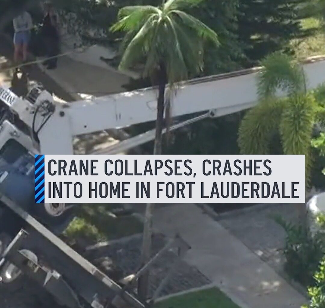 Video shows a crane and a truck that overturned onto a house in Fort Lauderdale on Thursday. The footage taken by fire rescue shows a crane leaning on a home, and the truck attached to it dangling in the air, with only one tire in the ground. #crane #fortlauderdale #home #crash