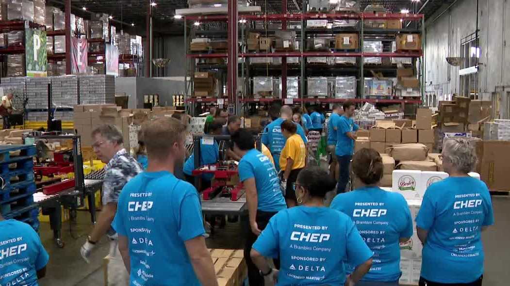 Central Florida volunteers pack meals at Second Harvest Food Bank