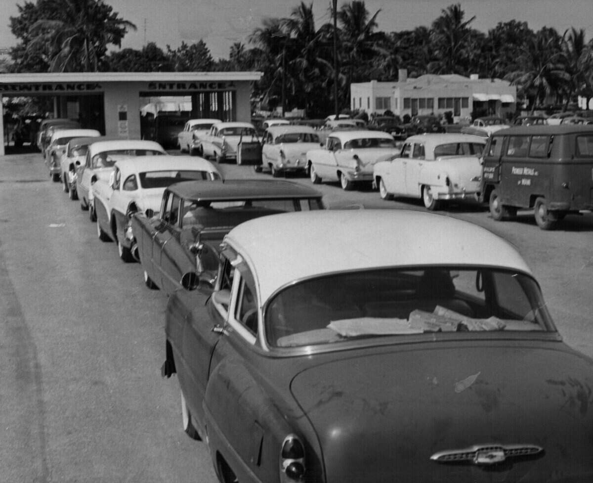 Cars line up at a Miami Shores auto inspection station.