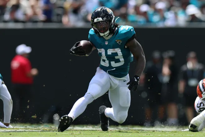 Sep 13, 2026; Jacksonville, Florida, USA; Jacksonville Jaguars running back Bhayshul Tuten (33) runs the ball in the second quarter against the Cleveland Browns at EverBank Stadium. Mandatory Credit: Nathan Ray Seebeck-Imagn Images