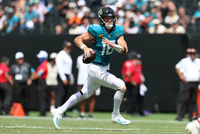 Sep 13, 2026; Jacksonville, Florida, USA; Jacksonville Jaguars quarterback Trevor Lawrence (16) runs with the ball in the second quarter against the Cleveland Browns at EverBank Stadium. Mandatory Credit: Nathan Ray Seebeck-Imagn Images
