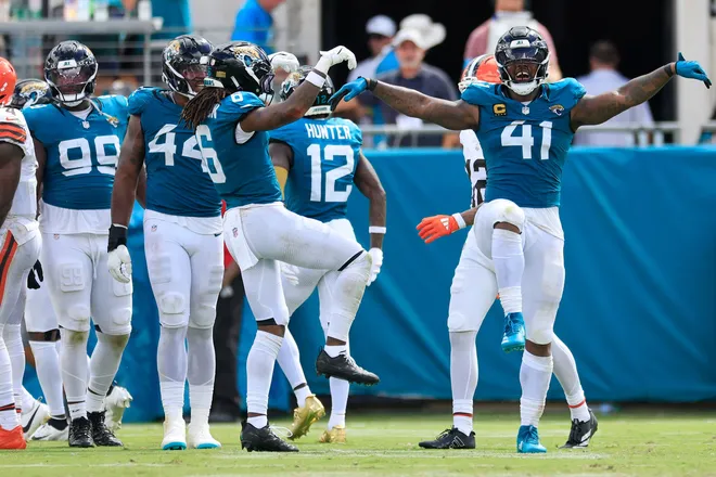 Jacksonville Jaguars defensive end Josh Hines-Allen (41) celebrates his tackle on Cleveland Browns quarterback Deshaun Watson (4), not shown, during the fourth quarter of an NFL football matchup at EverBank Stadium on Sunday, Sept. 13, 2026, in Jacksonville, Fla. The Jaguars defeated the Browns 34-10. [Corey Perrine/Florida Times-Union]
