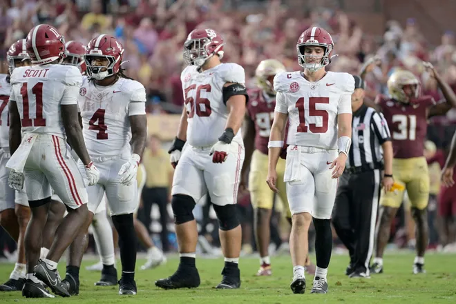 Aug 30, 2025; Tallahassee, Florida, USA; Alabama Crimson Tide quarterback Ty Simpson (15) reacts after a play against the Florida State Seminoles during the second half at Doak S. Campbell Stadium. Mandatory Credit: Melina Myers-Imagn Images