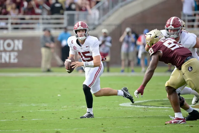 Aug 30, 2025; Tallahassee, Florida, USA; Alabama Crimson Tide quarterback Ty Simpson (15) looks to pass the ball against the Florida State Seminoles during the second half at Doak S. Campbell Stadium. Mandatory Credit: Melina Myers-Imagn Images