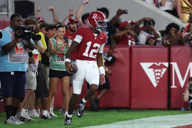 Sep 19, 2026; Tuscaloosa, Alabama, USA; Alabama Crimson Tide quarterback Keelon Russell (12) celebrates after scoring a touchdown against the Florida State Seminoles during the second half at Saban Field at Bryant-Denny Stadium. Mandatory Credit: David Leong-Imagn Images