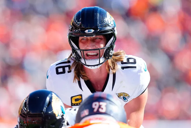 Sep 20, 2026; Denver, Colorado, USA;  Jacksonville Jaguars quarterback Trevor Lawrence (16) calls out signals against the Denver Broncos during the second half at Empower Field at Mile High.  Mandatory Credit: Ron Chenoy-Imagn Images