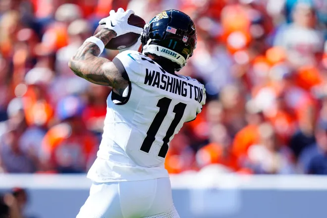 Sep 20, 2026; Denver, Colorado, USA;  Jacksonville Jaguars wide receiver Parker Washington (11) makes a catch against the Denver Broncos in the first half at Empower Field at Mile High.  Mandatory Credit: Ron Chenoy-Imagn Images