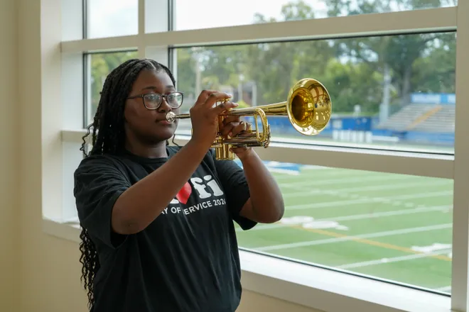 A trumpet sounds at Riverside High School as a music students breaks in one of $38,500 worth of new instruments donated by nonprofit Mr. Holland’s Opus Foundation.