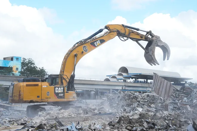 An Excavator operator makes a pile of recyclables while removing debris from the teardown of the First Baptist Church of Jacksonville’s old sanctuary in downtown Jacksonville, Fla. Wednesday, September 23, 2026.