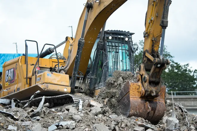 Excavator operators made piles of debris from the teardown of the First Baptist Church of Jacksonville’s old sanctuary in downtown Jacksonville, Fla. Wednesday, September 23, 2026.