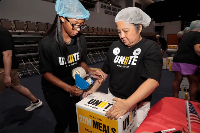 A box of packed meals is prepared to be delivered to the Feeding Northeast Florida food bank. On Sept. 11, 719 Jacksonville-area volunteers packed 340,992 meals as part of national nonprofit 9/11 Day's goal to transform the anniversary into a day of "doing good."