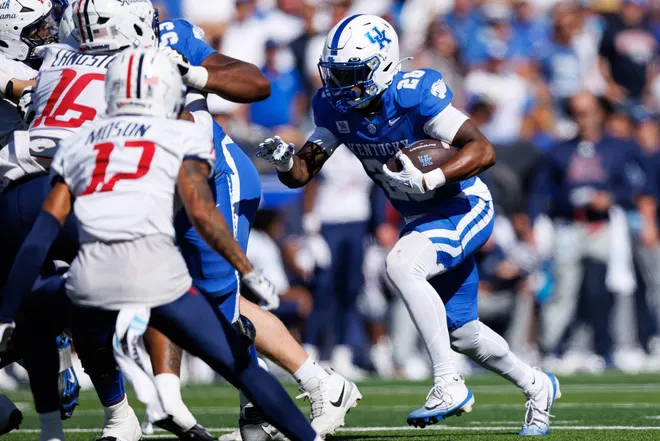 Sep 26, 2026; Lexington, Kentucky, USA; Kentucky Wildcats running back Jason Patterson (26) runs the ball during the fourth quarter against the South Alabama Jaguars at Kroger Field. Mandatory Credit: Jordan Prather-Imagn Images