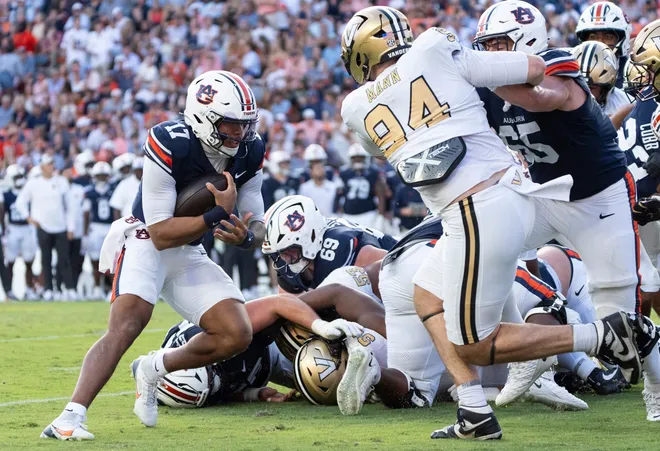 Auburn Tigers quarterback Byrum Brown (17) runs in for a touchdown as Auburn Tigers take on Vanderbilt Commodores at Jordan-Hare Stadium in Auburn, Ala. on Saturday, Sept. 26, 2026. Auburn Tigers defeated Vanderbilt Commodores 21-15.