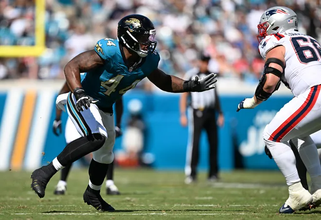 Sep 27, 2026; Jacksonville, Florida, USA; Jacksonville Jaguars defensive end Travon Walker (44) defends against New England Patriots offensive tackle Will Campbell (66) during the third quarter at EverBank Stadium. Mandatory Credit: Melina Myers-Imagn Images