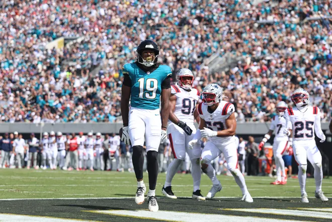 Sep 27, 2026; Jacksonville, Florida, USA; Jacksonville Jaguars wide receiver Josh Cameron (19) reacts after scoring a touchdown during the second quarter against the New England Patriots at EverBank Stadium. Mandatory Credit: Morgan Tencza-Imagn Images