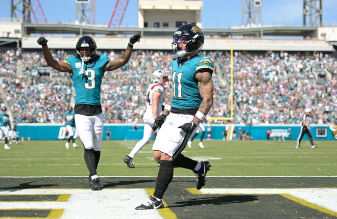 Sep 27, 2026; Jacksonville, Florida, USA; Jacksonville Jaguars wide receiver Parker Washington (11) celebrates a touchdown during the third quarter against the New England Patriots at EverBank Stadium. Mandatory Credit: Melina Myers-Imagn Images