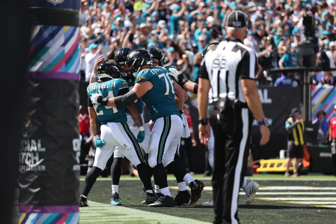 Sep 27, 2026; Jacksonville, Florida, USA; The Jacksonville Jaguars celebrate a touchdown by running back Chris Rodriguez Jr. (24) during the third quarter against the New England Patriots at EverBank Stadium. Mandatory Credit: Morgan Tencza-Imagn Images