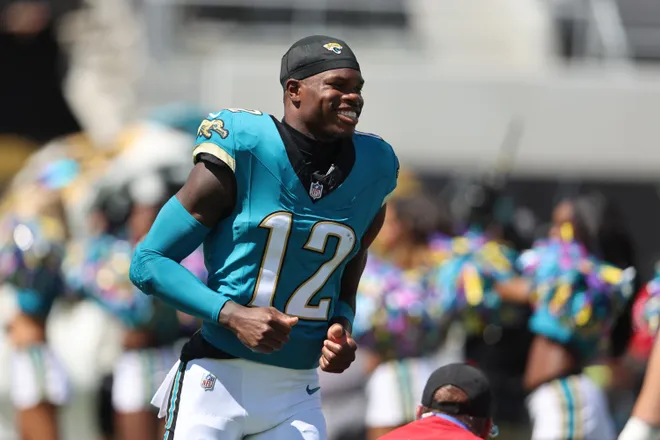 Sep 27, 2026; Jacksonville, Florida, USA; Jacksonville Jaguars wide receiver Travis Hunter (12) runs out for player introductions prior to a game against the New England Patriots at EverBank Stadium. Mandatory Credit: Morgan Tencza-Imagn Images