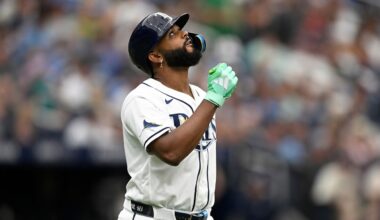 Tampa Bay Rays' Junior Caminero reacts while walking to first base during the sixth inning of a baseball game against the Seattle Mariners, Sunday, July 12, 2026, in St. Petersburg, Fla. (AP Photo/Phelan M. Ebenhack)