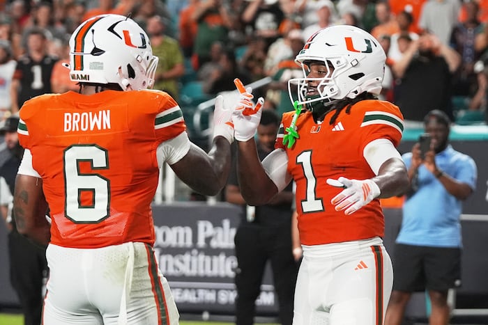 No. 7 Miami gains school-record 856 yards, rolls past Florida A&M 77-7