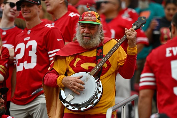 The San Francisco 49ers "Banjo Man" Stacy Samuels plays his banjo in the stands  in the second quarter of their NFL game at Levi's Stadium in Santa Clara, Calif., on Sunday, Sept. 20, 2026. (Jose Carlos Fajardo/Bay Area News Group)