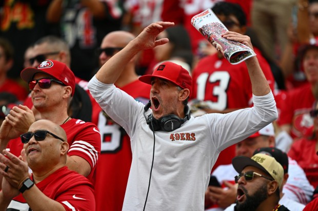 A San Francisco 49ers fan dressed as San Francisco 49ers head coach Kyle Shanahan cheers from the stands in the second quarter of their NFL game at Levi's Stadium in Santa Clara, Calif., on Sunday, Sept. 20, 2026. (Jose Carlos Fajardo/Bay Area News Group)