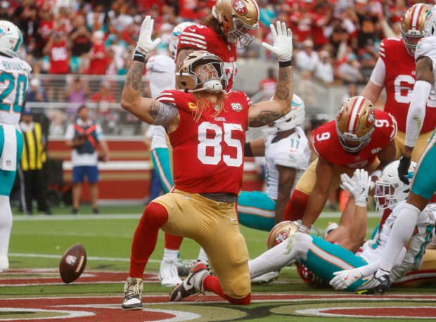 San Francisco 49ers' George Kittle (85) celebrates a touchdown by San Francisco 49ers' Christian McCaffrey (23) against the Miami Dolphins in the third quarter at Levi's Stadium in Santa Clara, Calif., on Sunday, Sept. 20, 2026. (Nhat V. Meyer/Bay Area News Group)