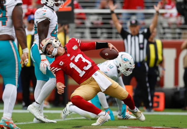 San Francisco 49ers starting quarterback Brock Purdy (13) gets up after scoring a touchdown against the Miami Dolphins in the second quarter at Levi's Stadium in Santa Clara, Calif., on Sunday, Sept. 20, 2026. (Nhat V. Meyer/Bay Area News Group)