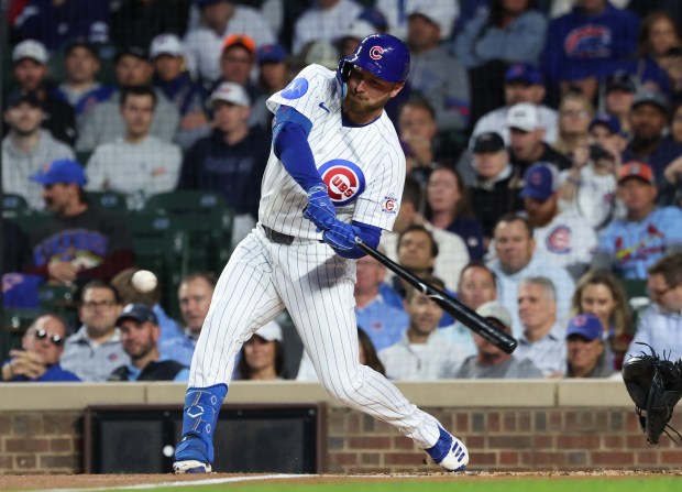 Cubs first baseman Michael Busch swings for a single in the first inning against the Marlins at Wrigley Field on Sept. 22, 2026, in Chicago. (John J. Kim/Chicago Tribune)