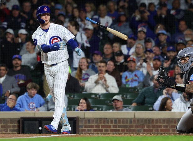 Cubs center fielder Pete Crow-Armstrong tosses the bat after drawing a walk in the third inning against the Marlins at Wrigley Field on Sept. 22, 2026, in Chicago. (John J. Kim/Chicago Tribune)