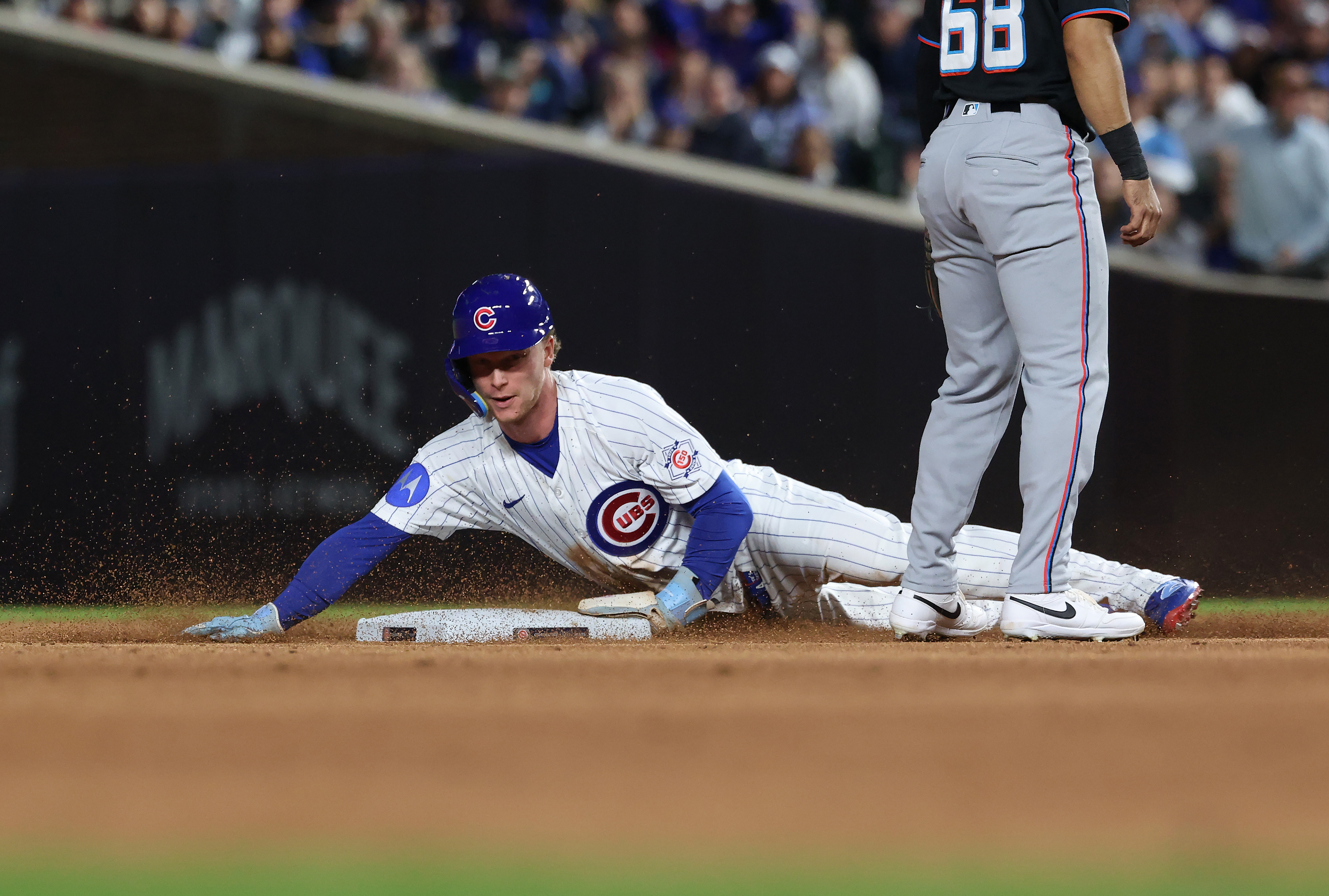 Cubs center fielder Pete Crow-Armstrong steals second base in the third inning against the Marlins at Wrigley Field on Sept. 22, 2026, in Chicago. It was his 39th steal of the season. (John J. Kim/Chicago Tribune)