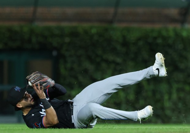 Marlins second baseman Jared Serna fields a ball hit for a single from Cubs catcher Carson Kelly in the fifth inning at Wrigley Field on Sept. 22, 2026, in Chicago. (John J. Kim/Chicago Tribune)