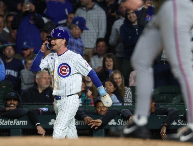 Cubs center fielder Pete Crow-Armstrong smiles while heading back to first base after a successful Cubs challenge resulting in a single for Crow-Armstrong in the sixth inning against the Marlins at Wrigley Field on Sept. 22, 2026, in Chicago. (John J. Kim/Chicago Tribune)