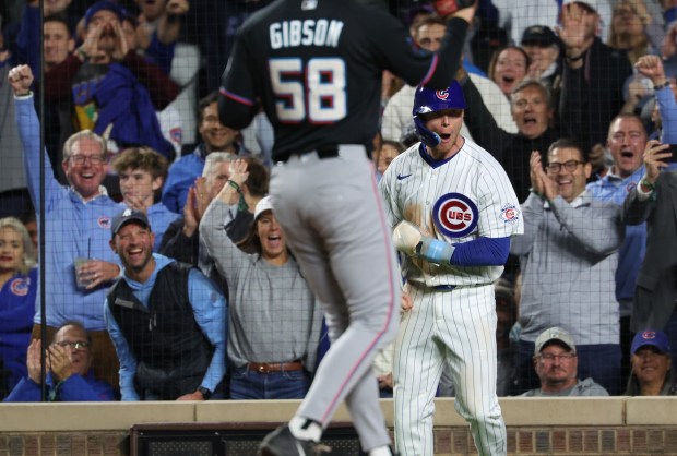 Cubs center fielder Pete Crow-Armstrong scores on an error from Marlins catcher Joe Mack in the sixth inning against the Marlins at Wrigley Field on Sept. 22, 2026, in Chicago. (John J. Kim/Chicago Tribune)