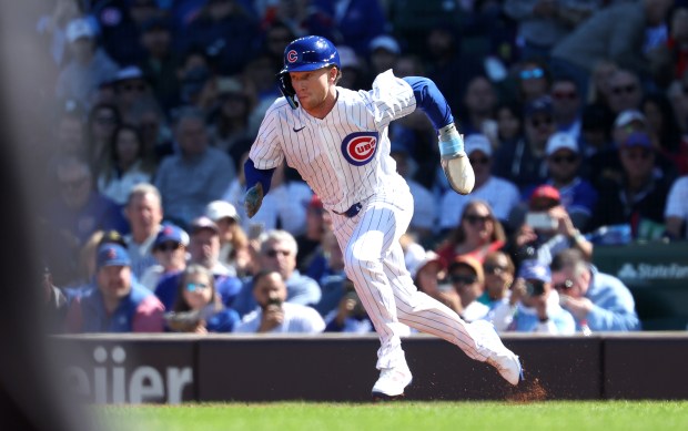 Chicago Cubs center fielder Pete Crow-Armstrong (4) steals second base in the first inning of a game against the Miami Marlins at Wrigley Field in Chicago on Sept. 24, 2026. With it being the 40th stolen base of the year for Crow-Armstrong, he joined the exclusive 40 homer/40 stolen base club. (Chris Sweda/Chicago Tribune)