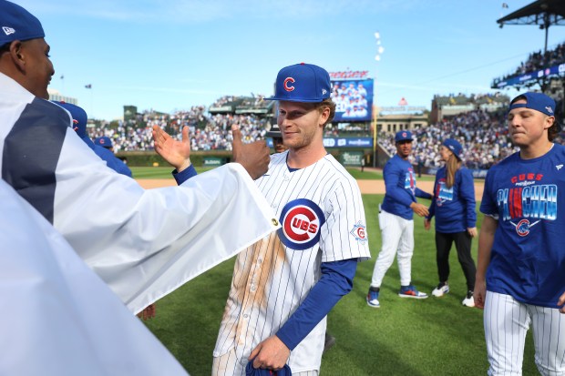 Pete Crow-Armstrong celebrates with teammates after the Cubs clinched a playoff spot with a victory against the Marlins on Thursday, Sept. 24, 2026, at Wrigley Field. (Chris Sweda/Chicago Tribune)