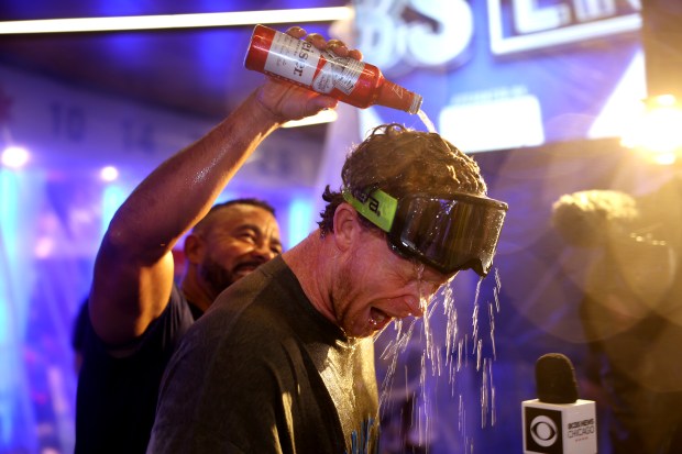 Pete Crow-Armstrong celebrates with teammates in the clubhouse after the Cubs clinched a playoff spot Thursday, Sept. 24, 2026, at Wrigley Field. (Chris Sweda/Chicago Tribune)